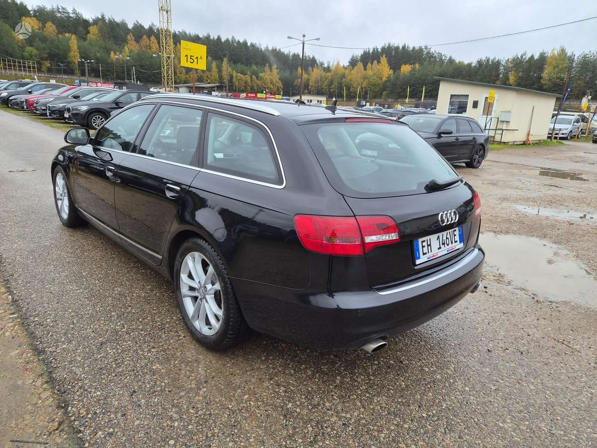 Audi A6 2011 — салон