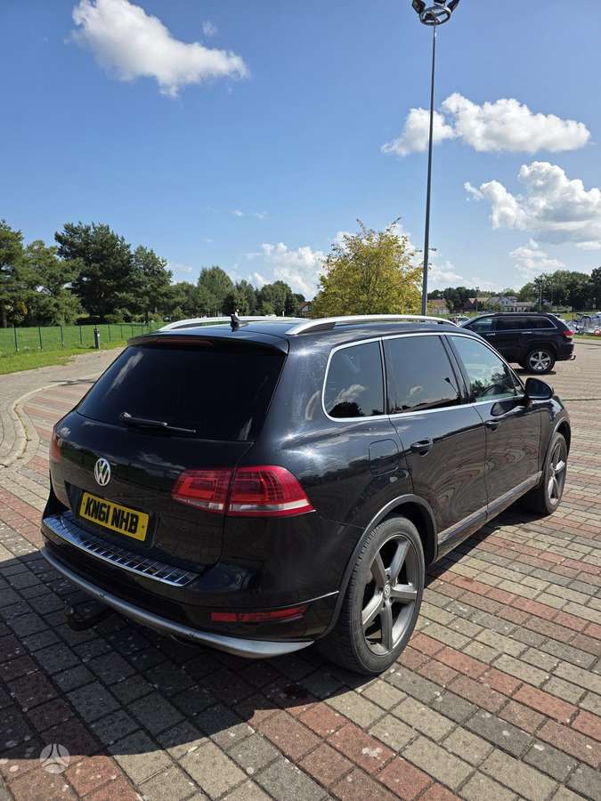Volkswagen Touareg 2011 — engine 2967 cm³, 204 HP (150kW)