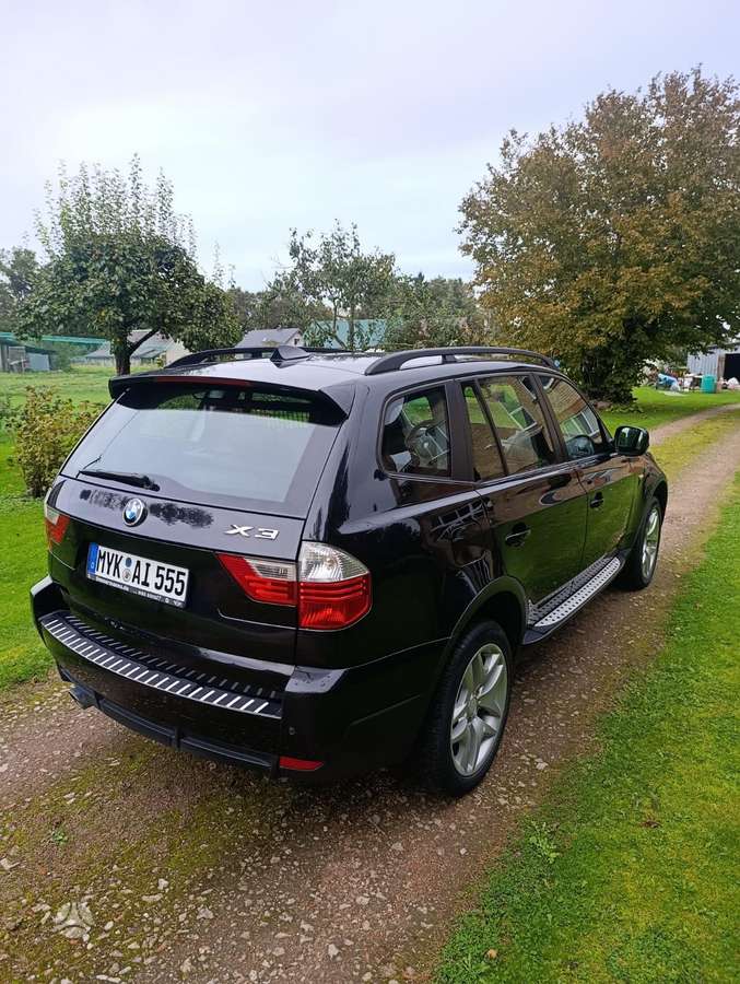 BMW X3 2010 — салон