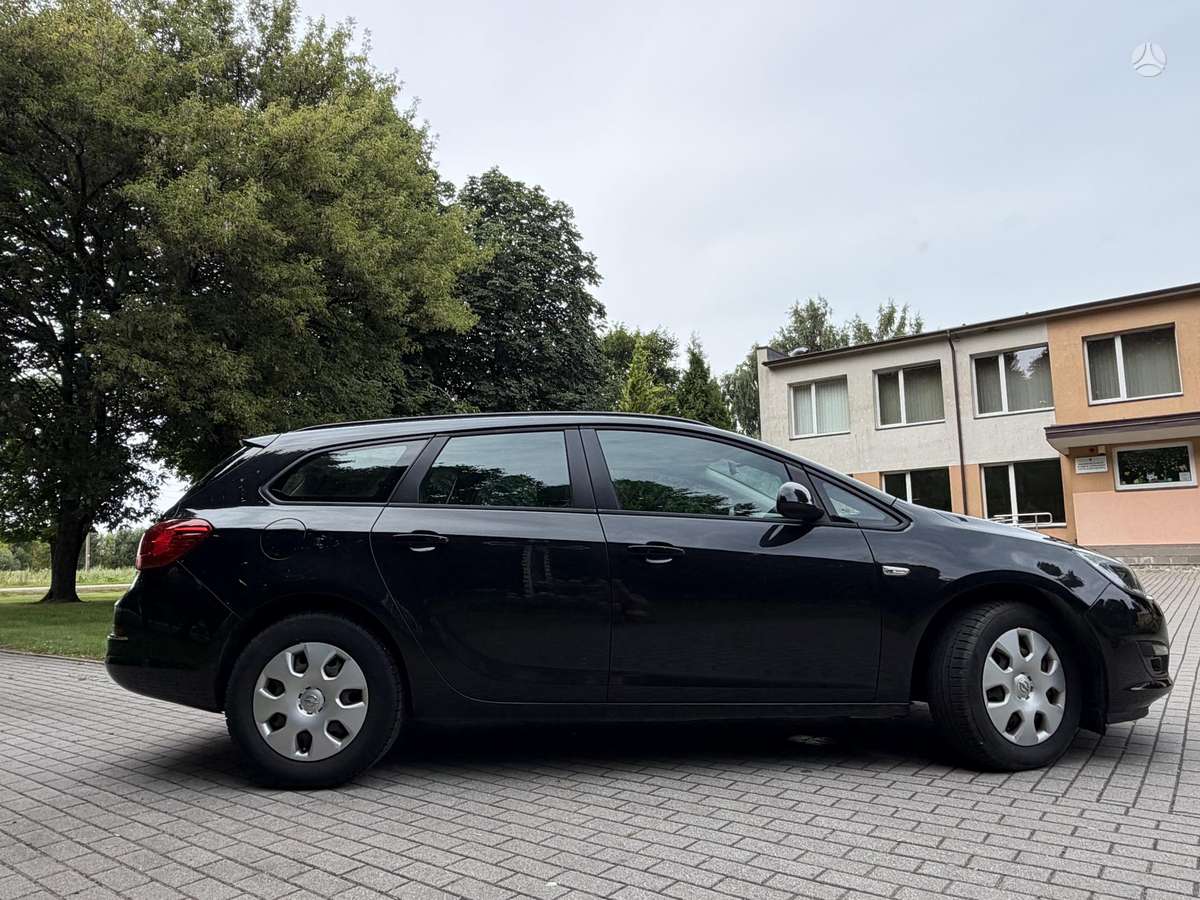 Opel Astra 2015 — фото 6