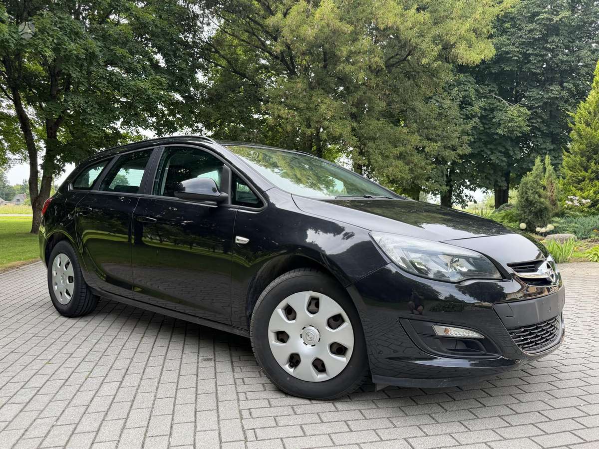 Opel Astra 2015 — фото 7