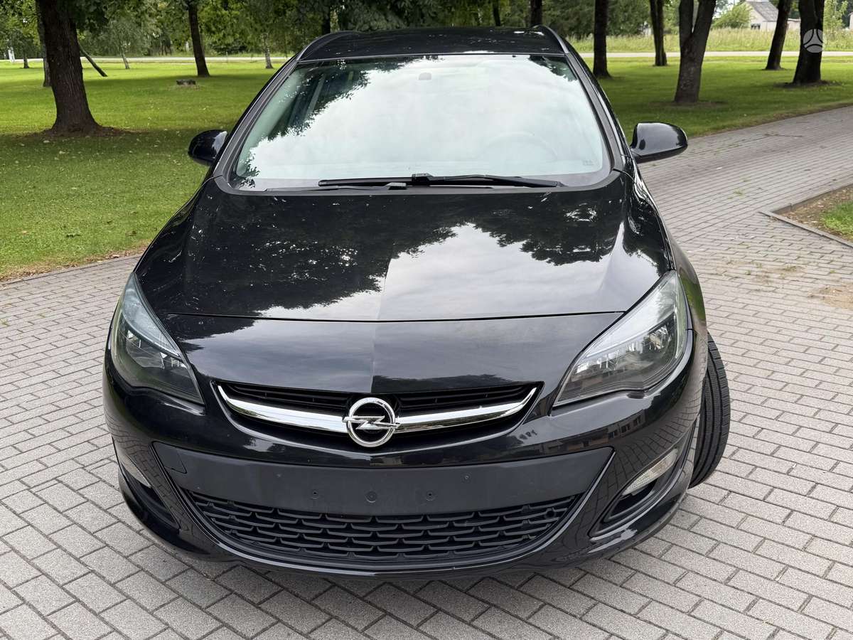 Opel Astra 2015 — фото 8