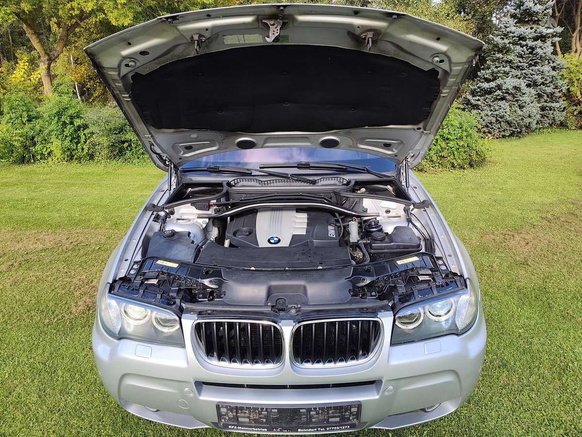 BMW X3 2008 — interior