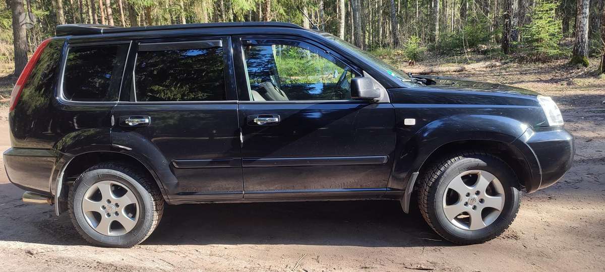 Nissan X-Trail 2006 — вигляд ззаду