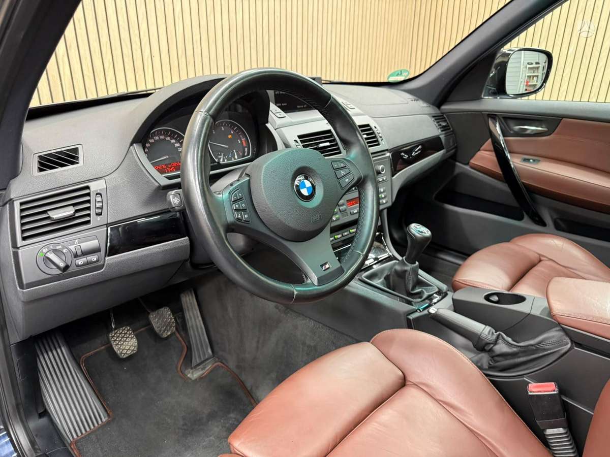 BMW X3 2010 — rear view