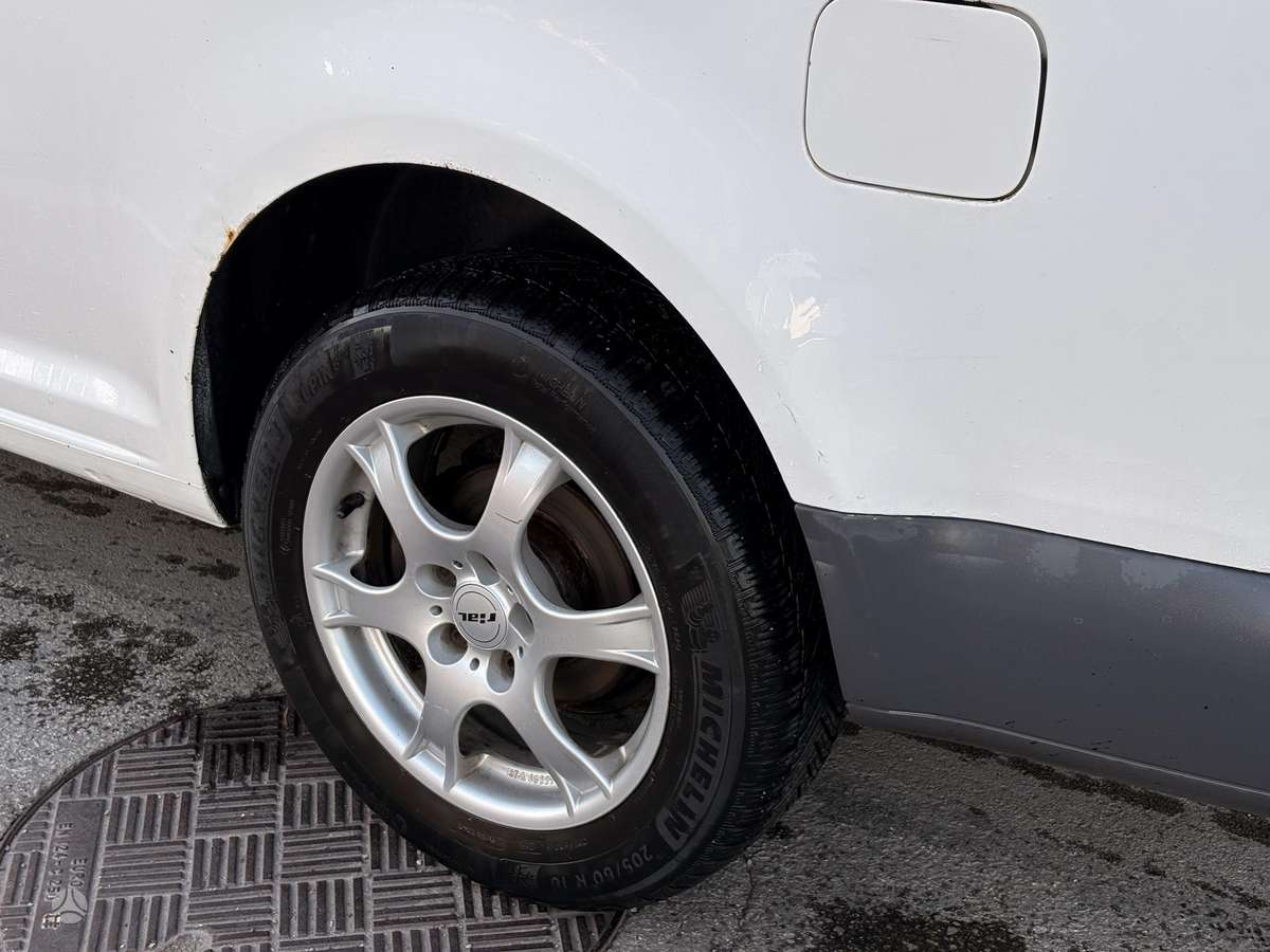 Volkswagen Caddy 2009 — engine 1900 cm³, 105 HP (77kW)