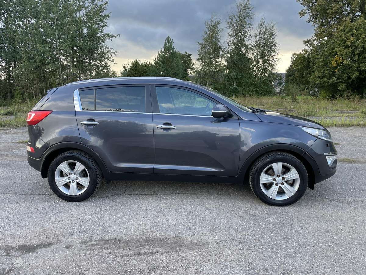 Kia Sportage 2011 — engine 1685 cm³, 116 HP (85kW)