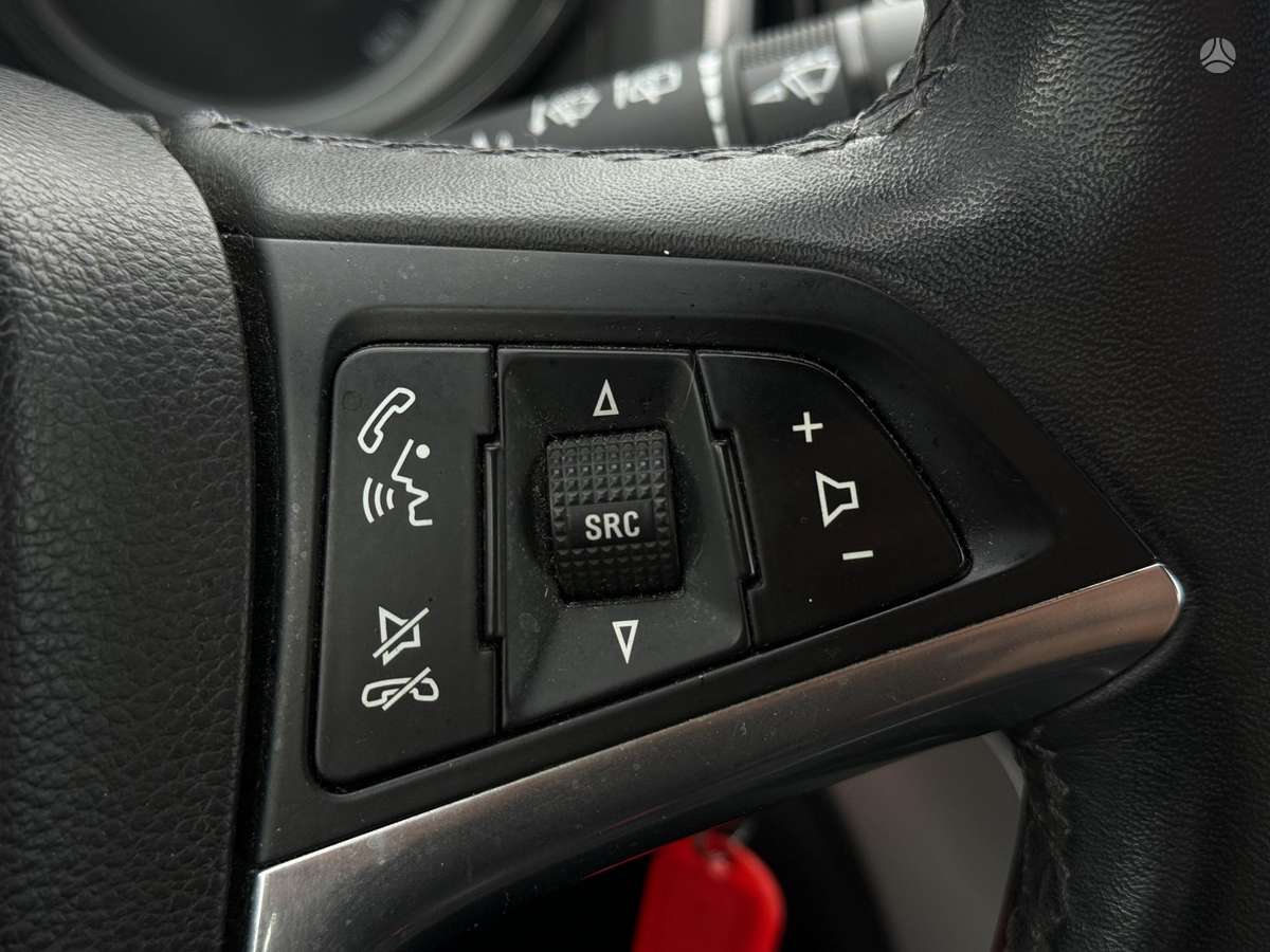 Opel Astra 2014 — photo 19