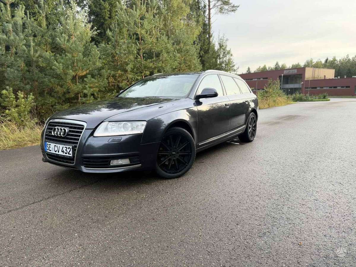 Audi A6 2009 — салон