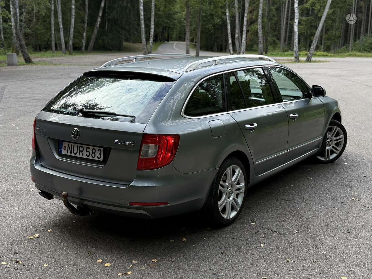 Skoda Superb 2011 — фото 5