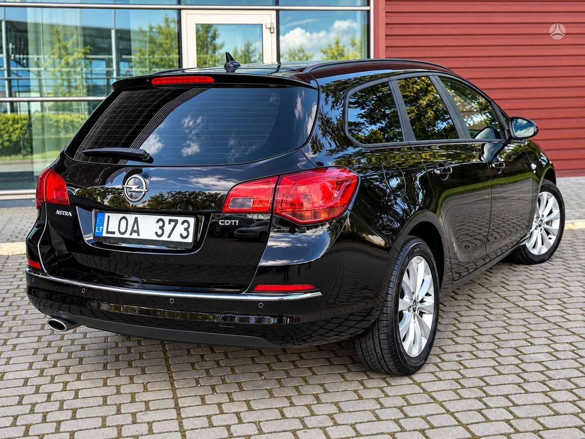 Opel Astra 2013 — engine 1956 cm³, 165 HP (121kW)