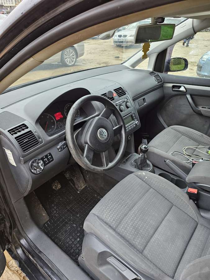Volkswagen Touran 2006 — engine 1896 cm³, 105 HP (77kW)