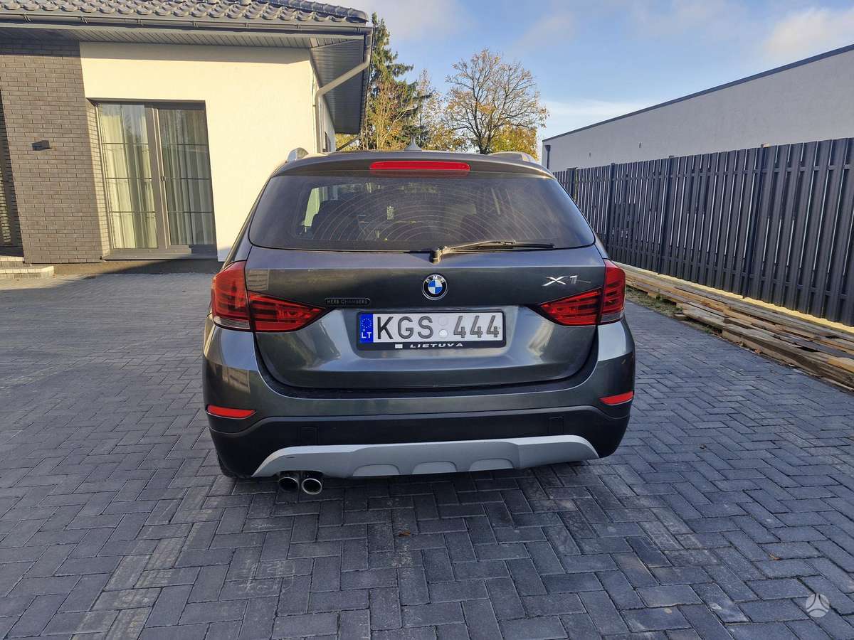 BMW X1 2014 — engine 1995 cm³, 245 HP (180kW)