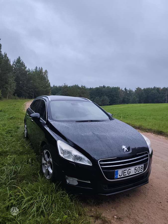 Peugeot 508 2012 — вигляд ззаду