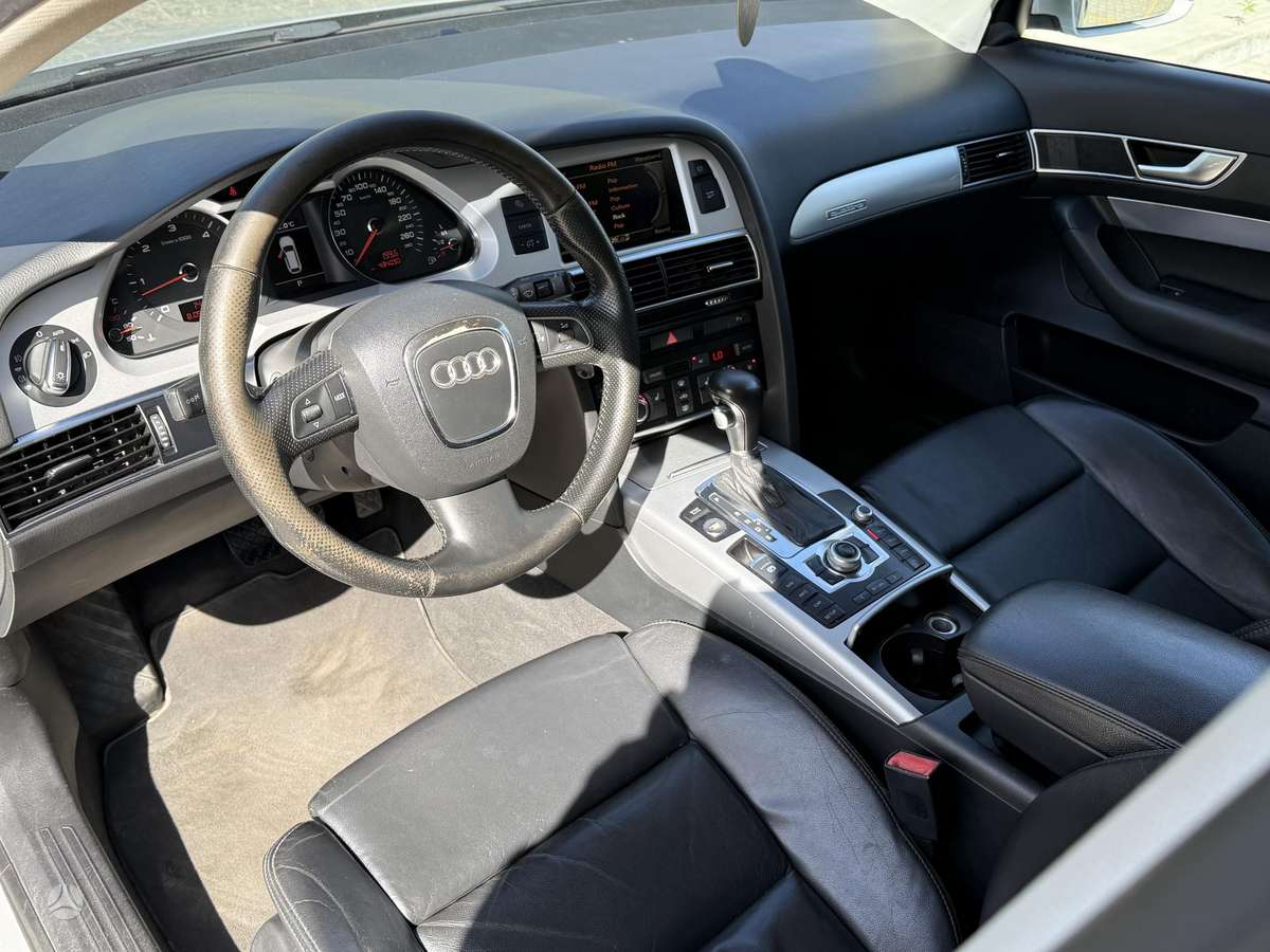 Audi A6 2010 — photo 7