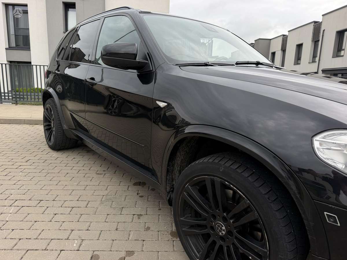 BMW X5 2009 — photo 10