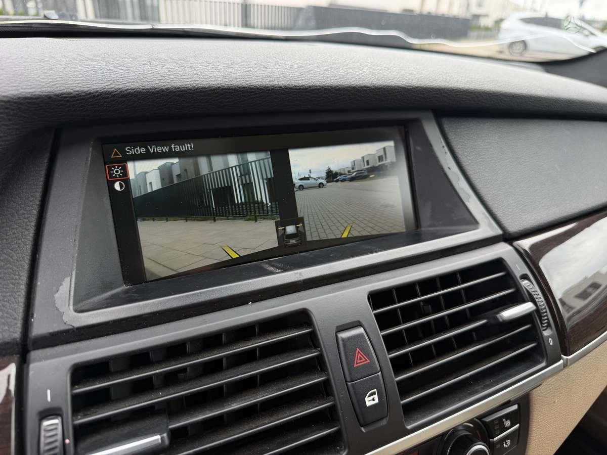 BMW X5 2009 — photo 24