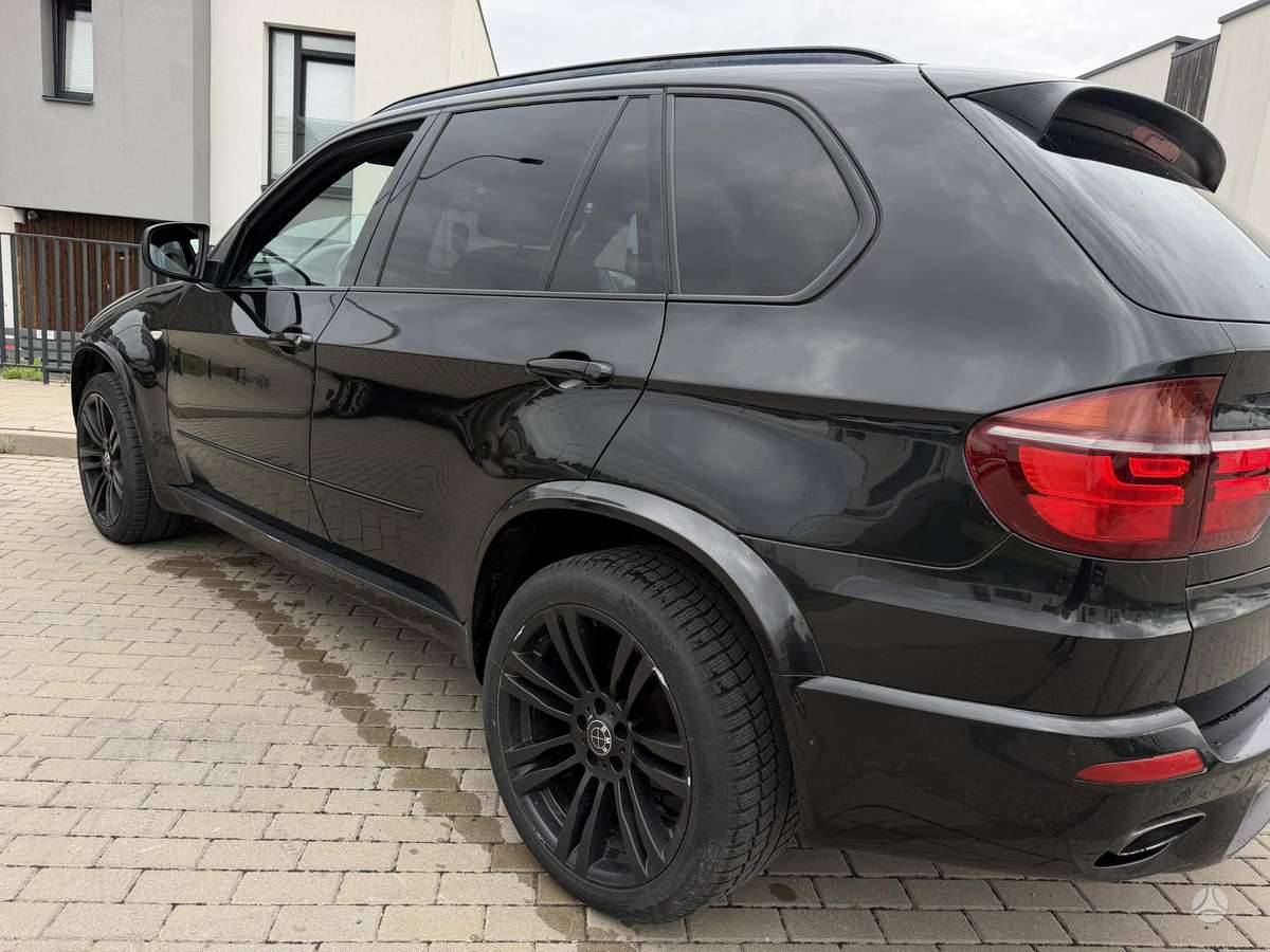 BMW X5 2009 — photo 7