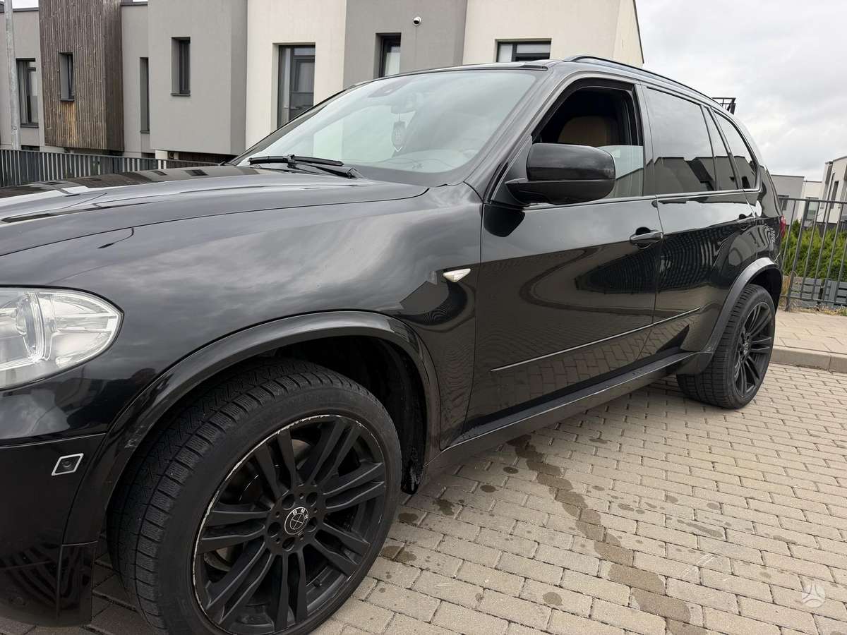 BMW X5 2009 — photo 8