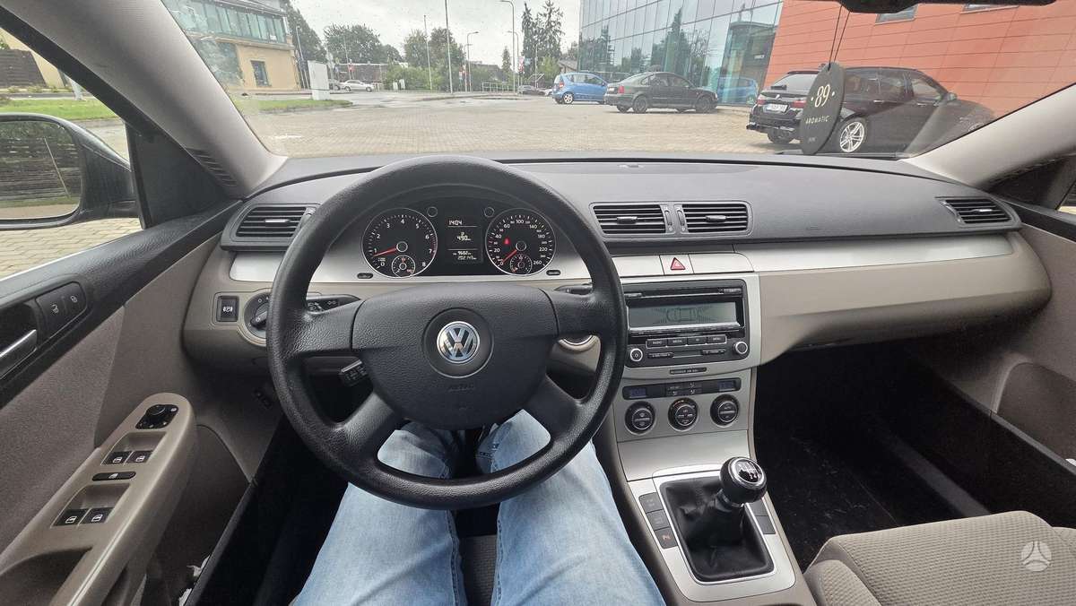 Volkswagen Passat 2009 — photo 20