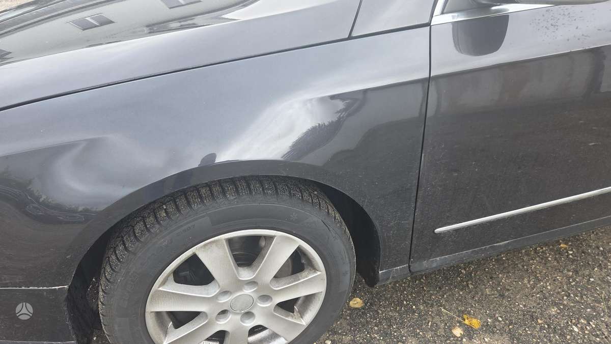 Volkswagen Passat 2009 — photo 24