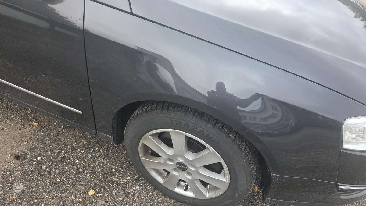 Volkswagen Passat 2009 — photo 26