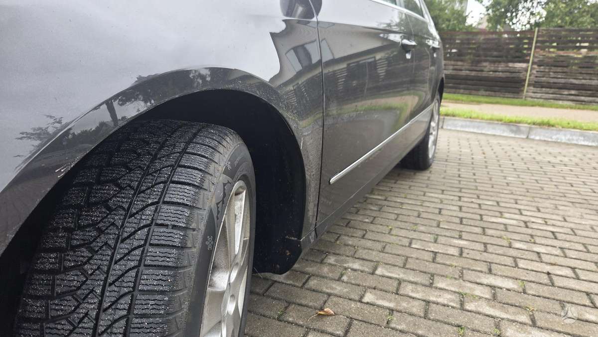 Volkswagen Passat 2009 — photo 8