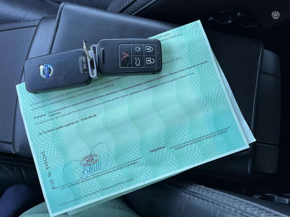 Volvo V70 2009 — photo 24