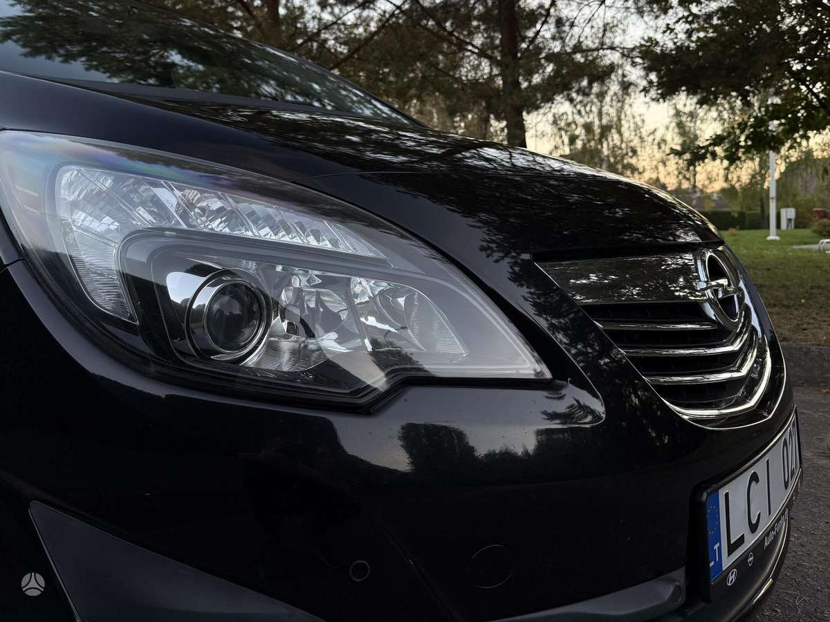 Opel Meriva 2010 — фото 10