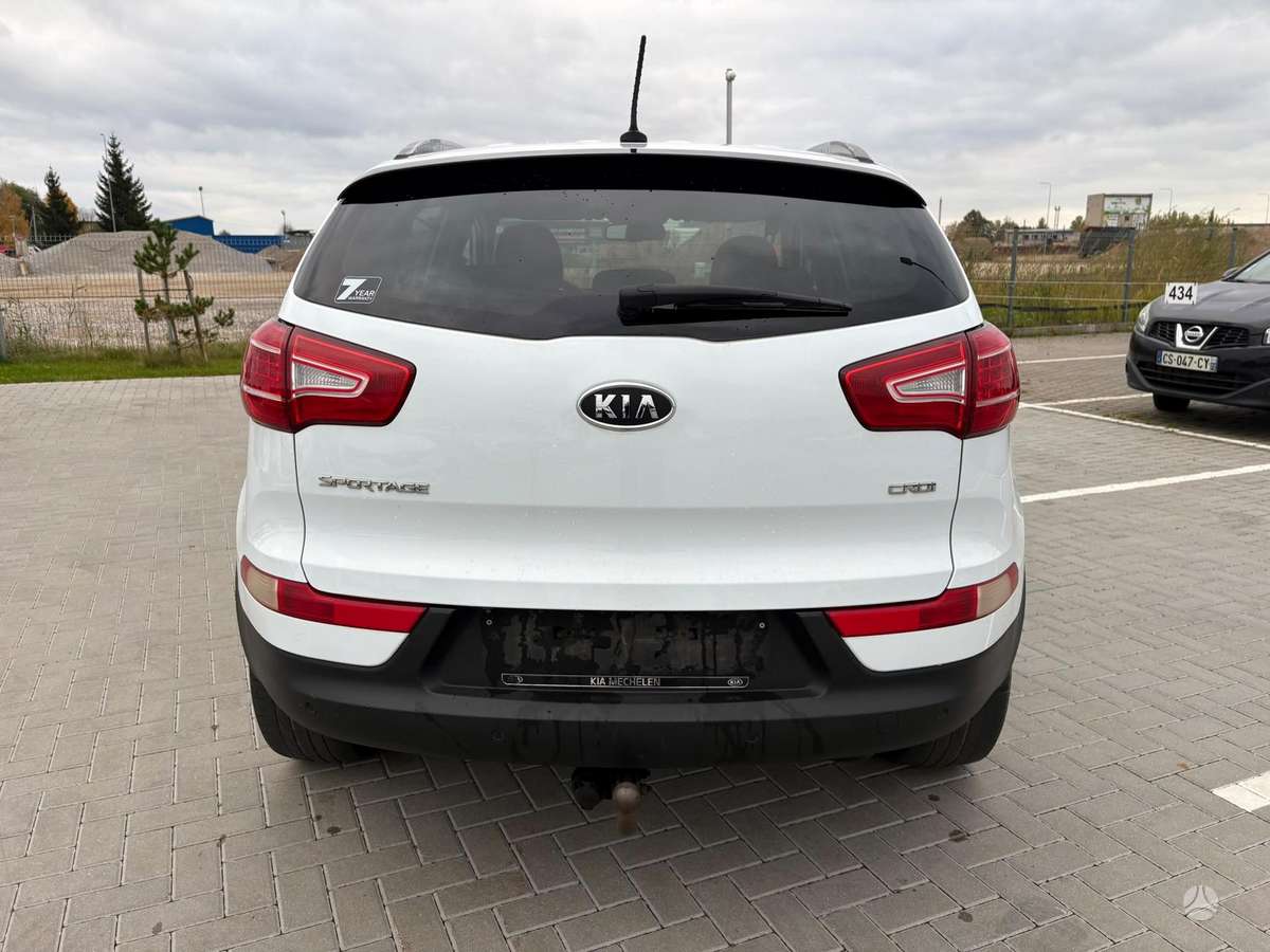 Kia Sportage 2011 — engine 1685 cm³, 116 HP (85kW)
