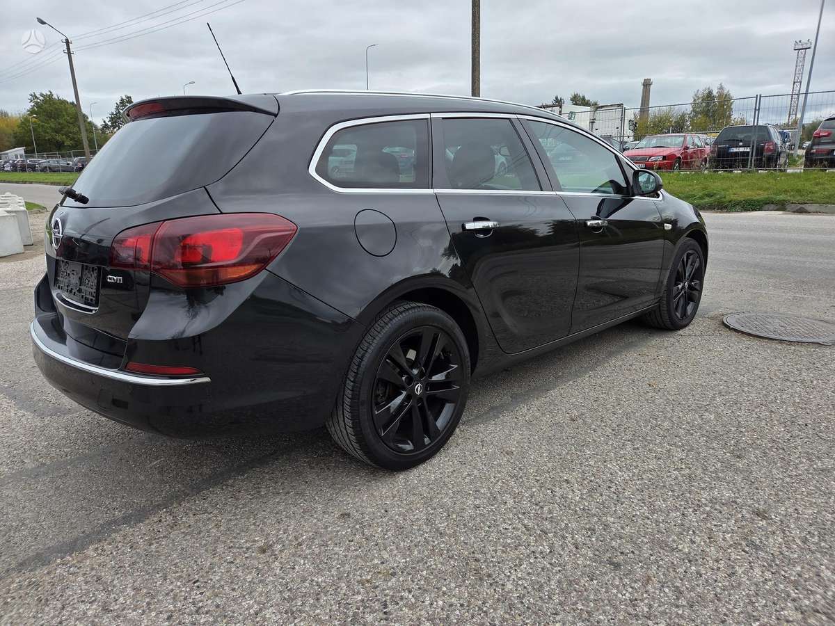 Opel Astra 2013 — engine 1956 cm³, 165 HP (121kW)