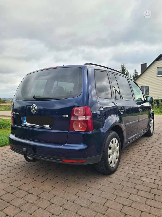 Volkswagen Touran 2009 — engine 1896 cm³, 105 HP (77kW)