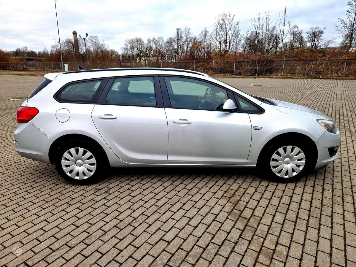 Opel Astra 2015 — фото 5
