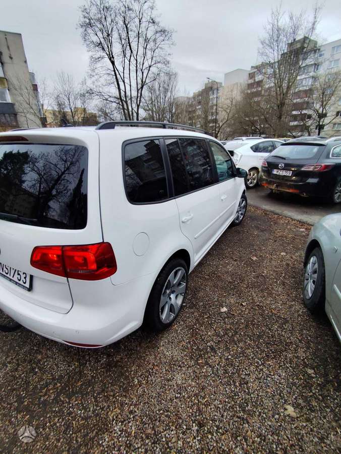 Volkswagen Touran 2014 — engine 1390 cm³, 140 HP (103kW)