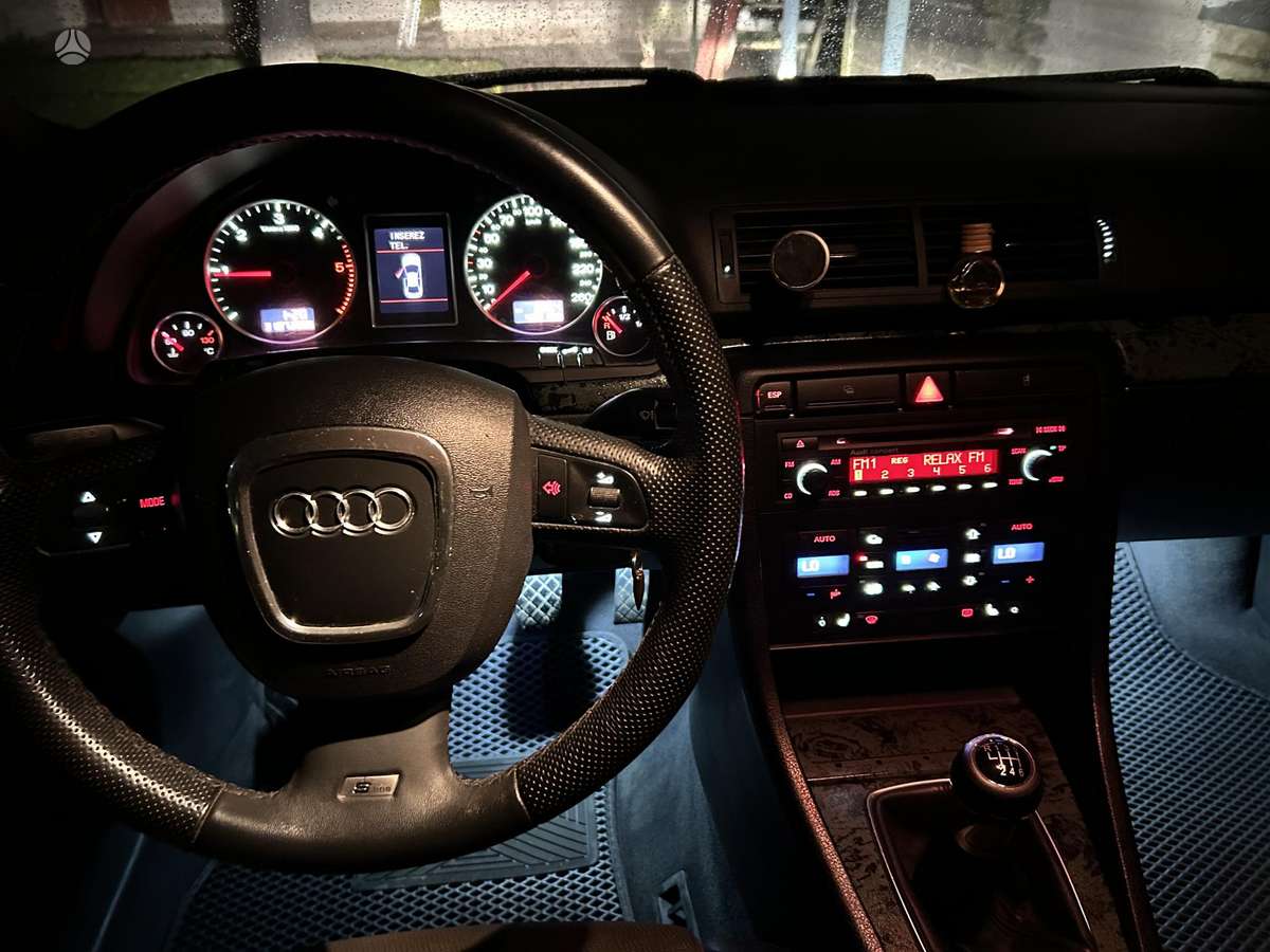 Audi A4 2006 — photo 14