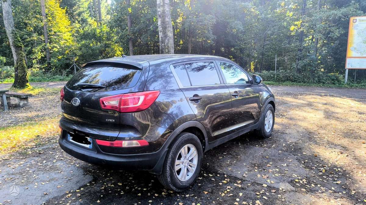 Kia Sportage 2012 — engine 1685 cm³, 116 HP (85kW)