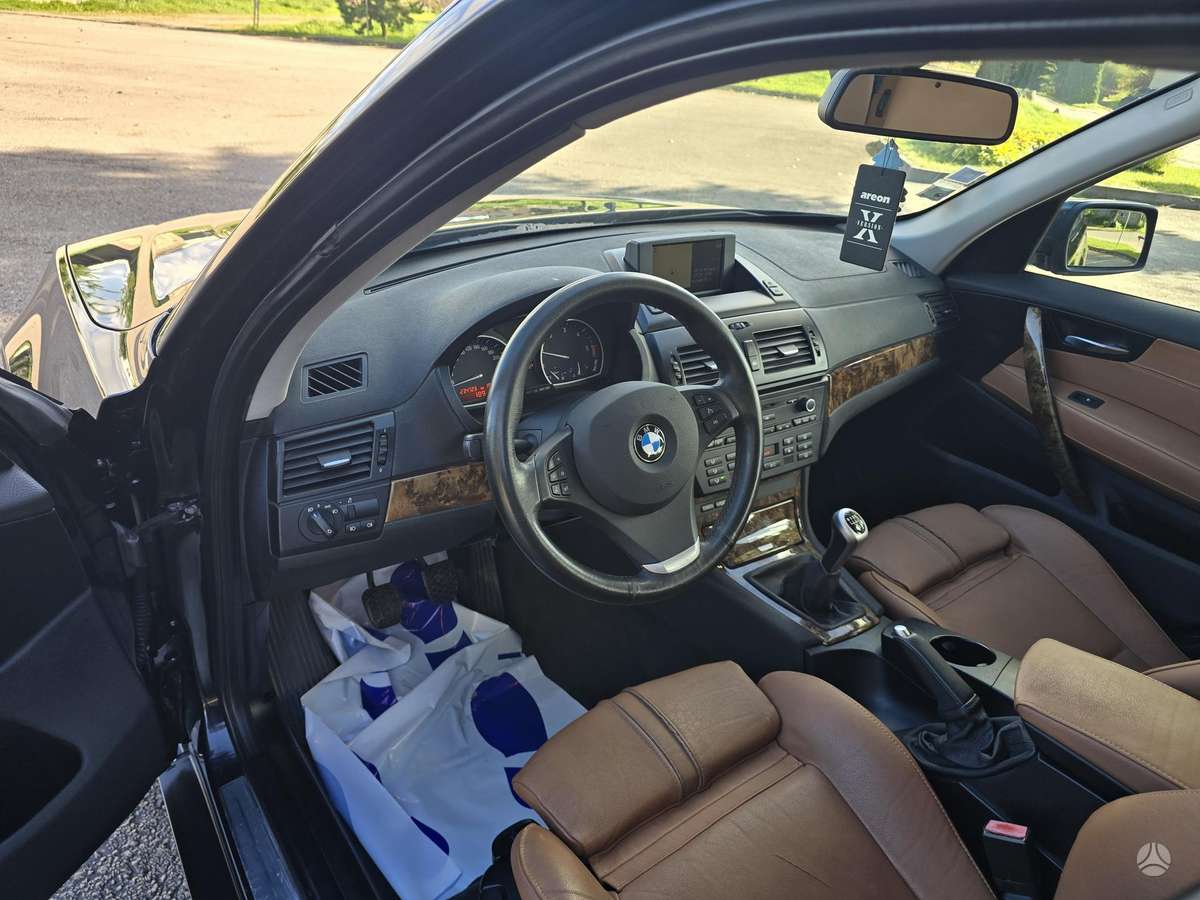 BMW X3 2009 — photo 12