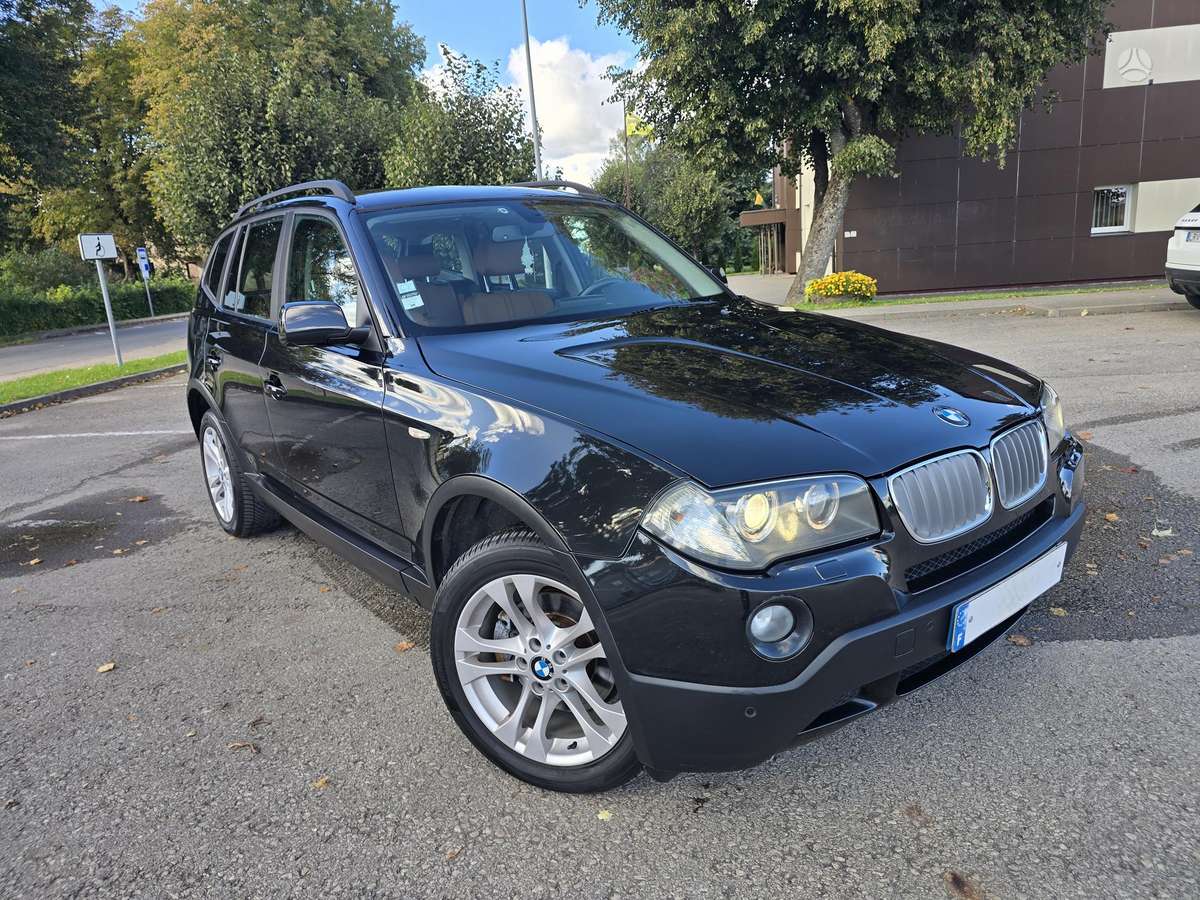BMW X3 2009 — rear view