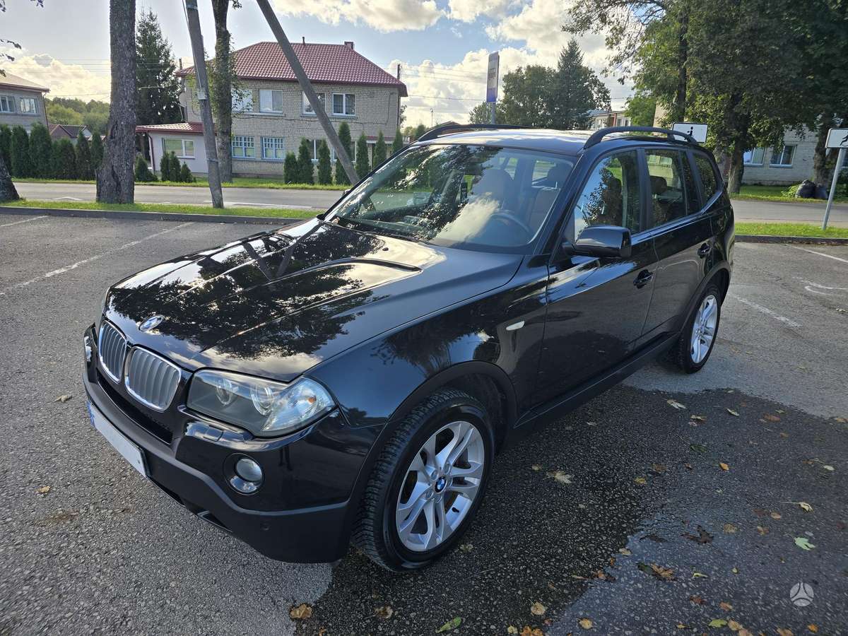 BMW X3 2009 — interior