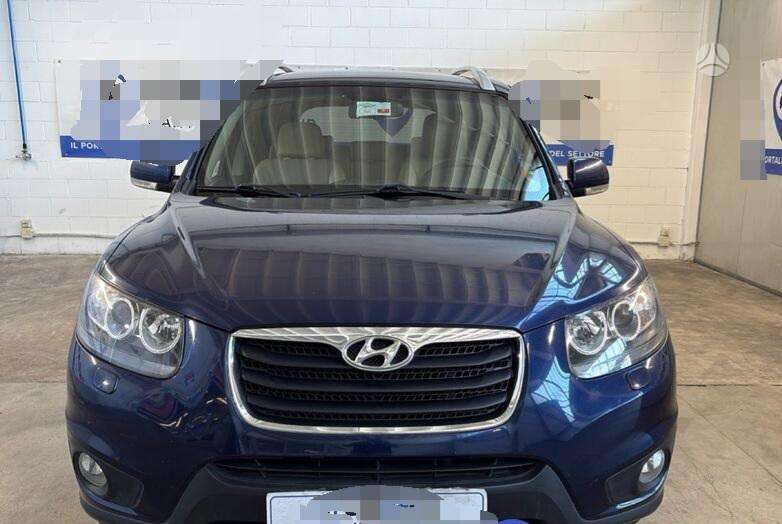 Hyundai Santa 2011 — вигляд ззаду