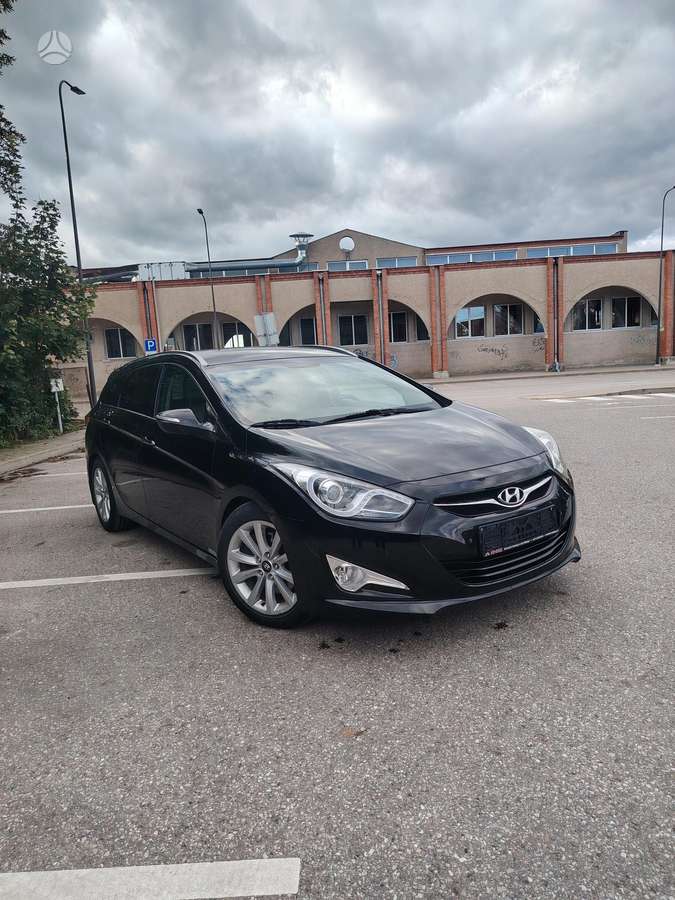 Hyundai i40 2013 — вигляд ззаду