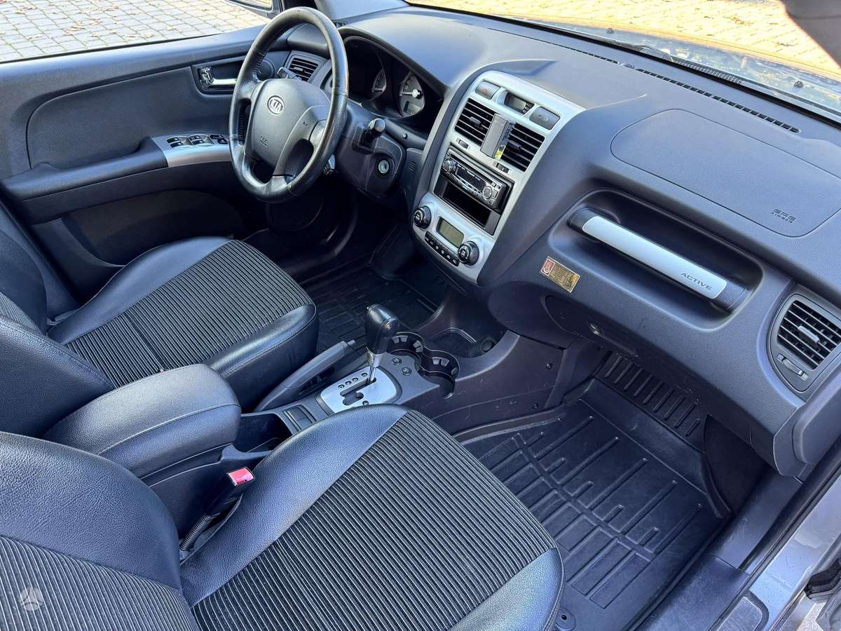 Kia Sportage 2008 — фото 12