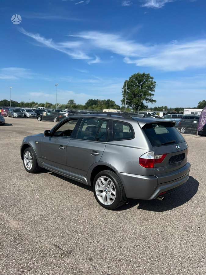 BMW X3 2009 — rear view