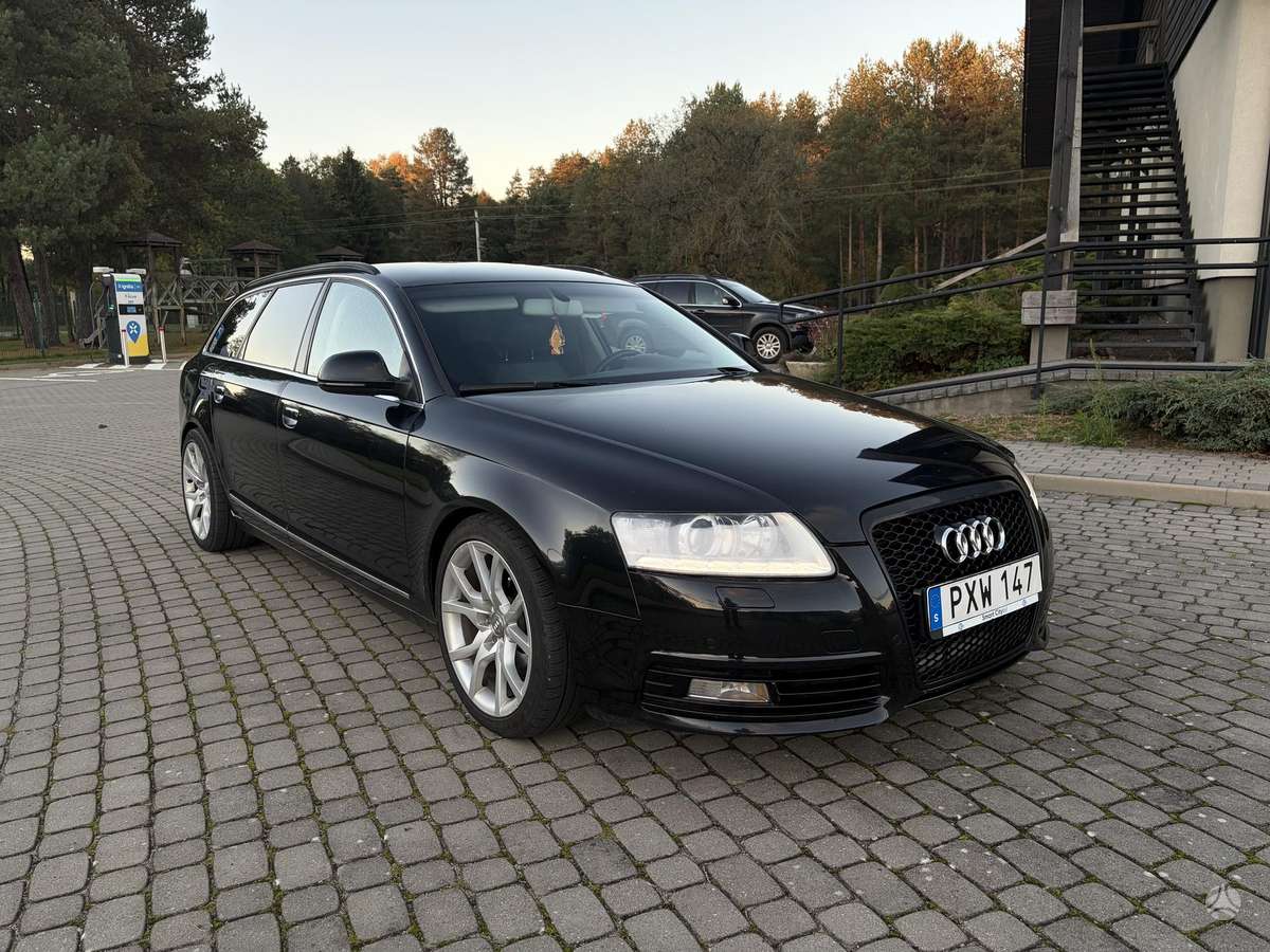 Audi A6 2010 — вигляд ззаду