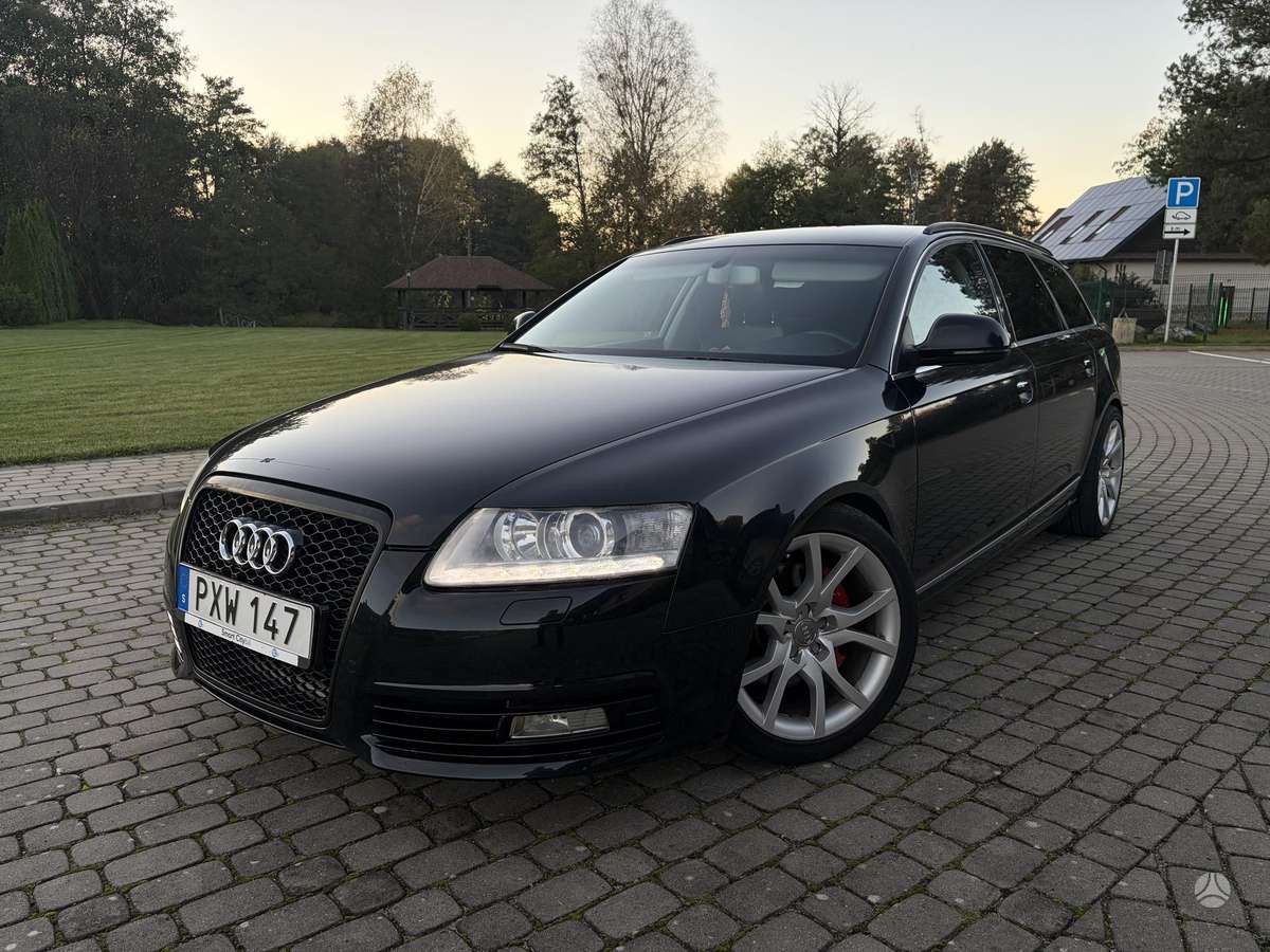Audi A6 2010 — салон