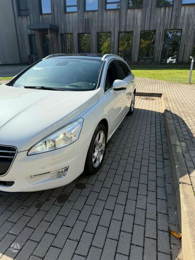 Peugeot 508 2014 — вигляд ззаду