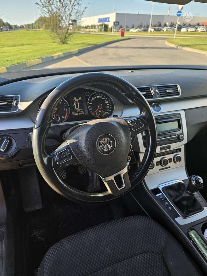 Volkswagen Passat 2014 — engine 1598 cm³, 105 HP (77kW)
