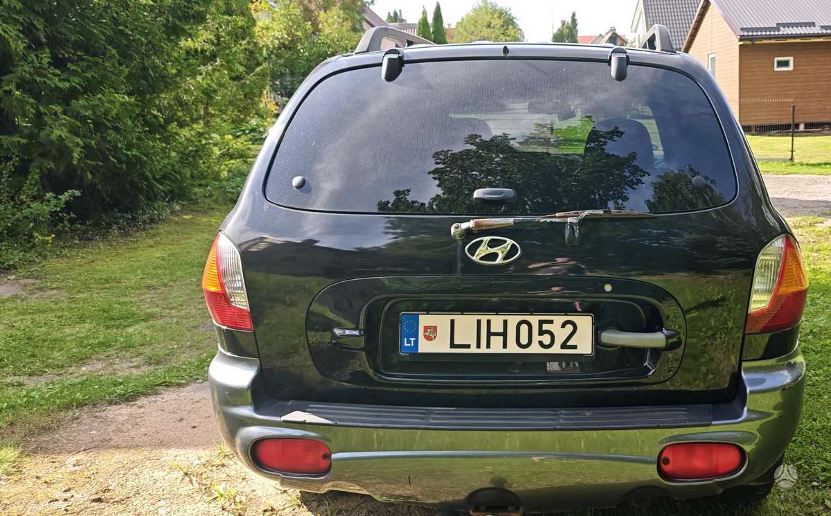Hyundai Santa 2004 — engine 2400 cm³, 145 HP (107kW)