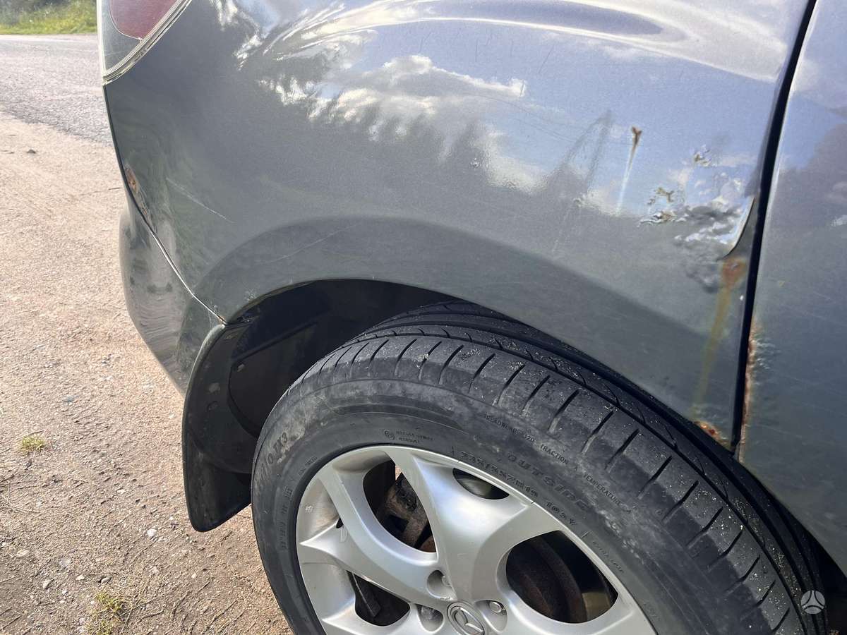 Mazda CX-7 2010 — photo 11
