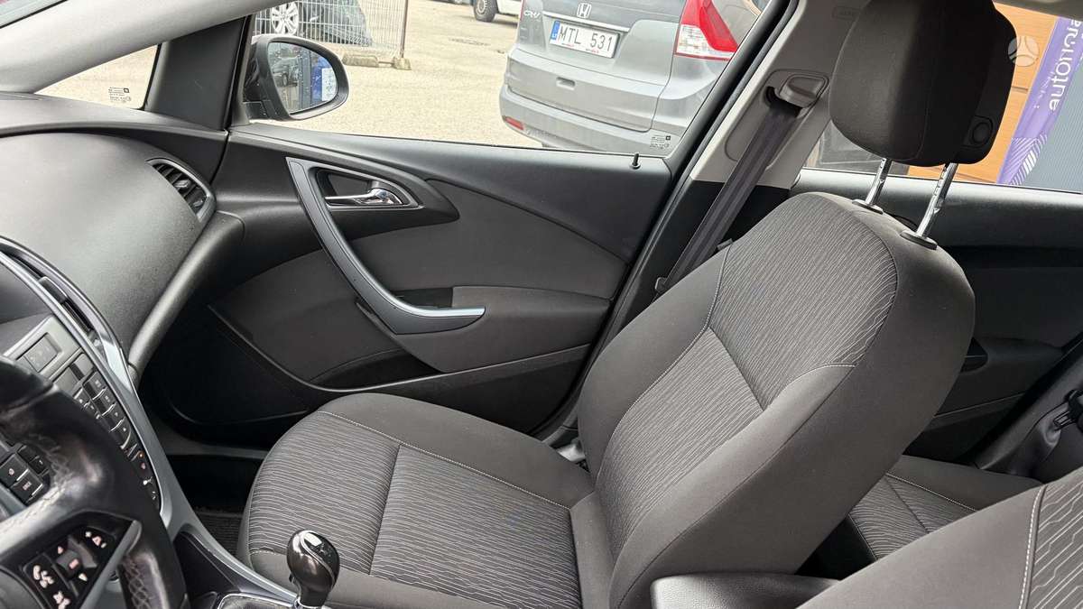 Opel Astra 2014 — photo 12